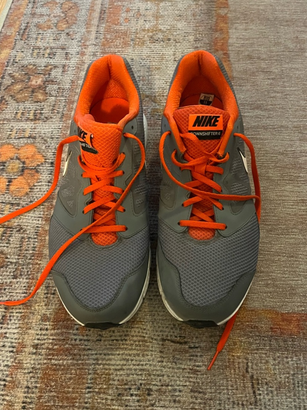 Nike Gray Sneakers with Bright Orange Accents